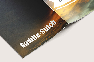 Saddle-stitched booklet with folded and stapled pages